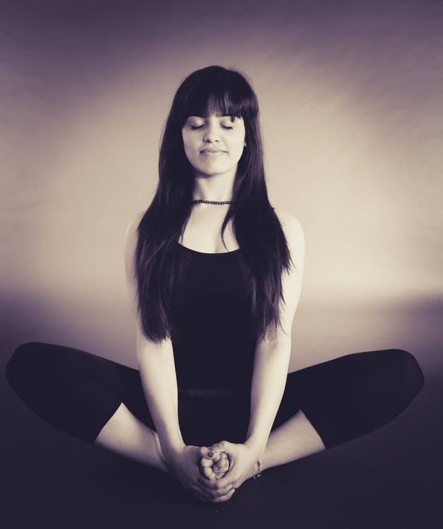 Meditation in Recovery, guided meditation, girl doing yoga dark hair