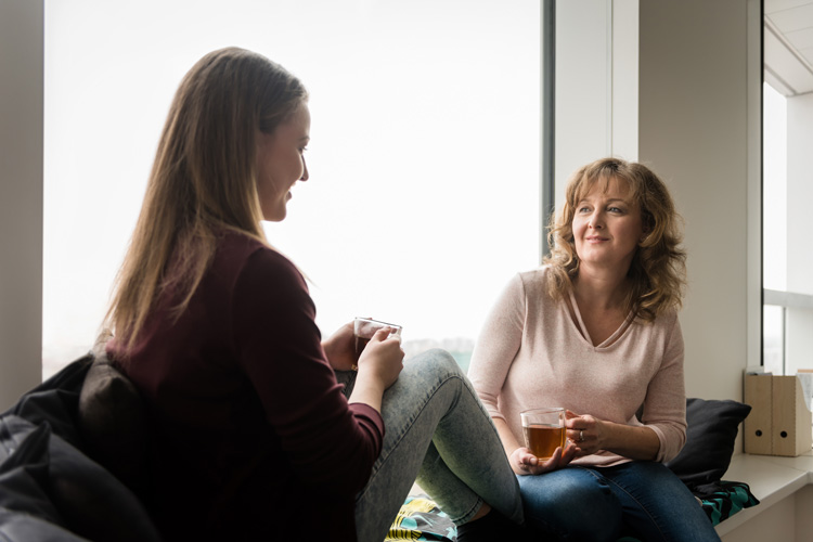 Enabling vs. Helping, line between helping and enabling, mother having conversation with daughter